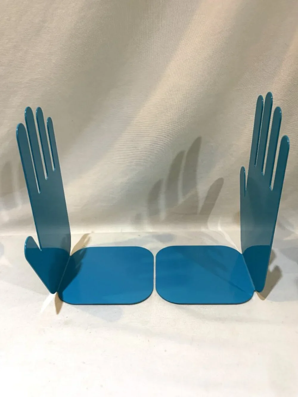 Pair of Jonathan Adler Teal Blue Metal Hands Bookends